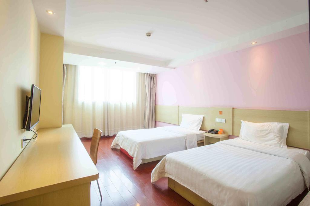 7Days Inn Meizhou Jia De Li Room photo